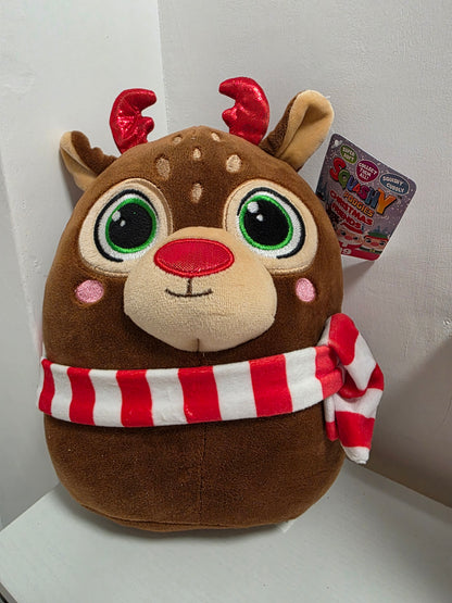 Plush reindeer toy with a red and white striped scarf on a light gray background