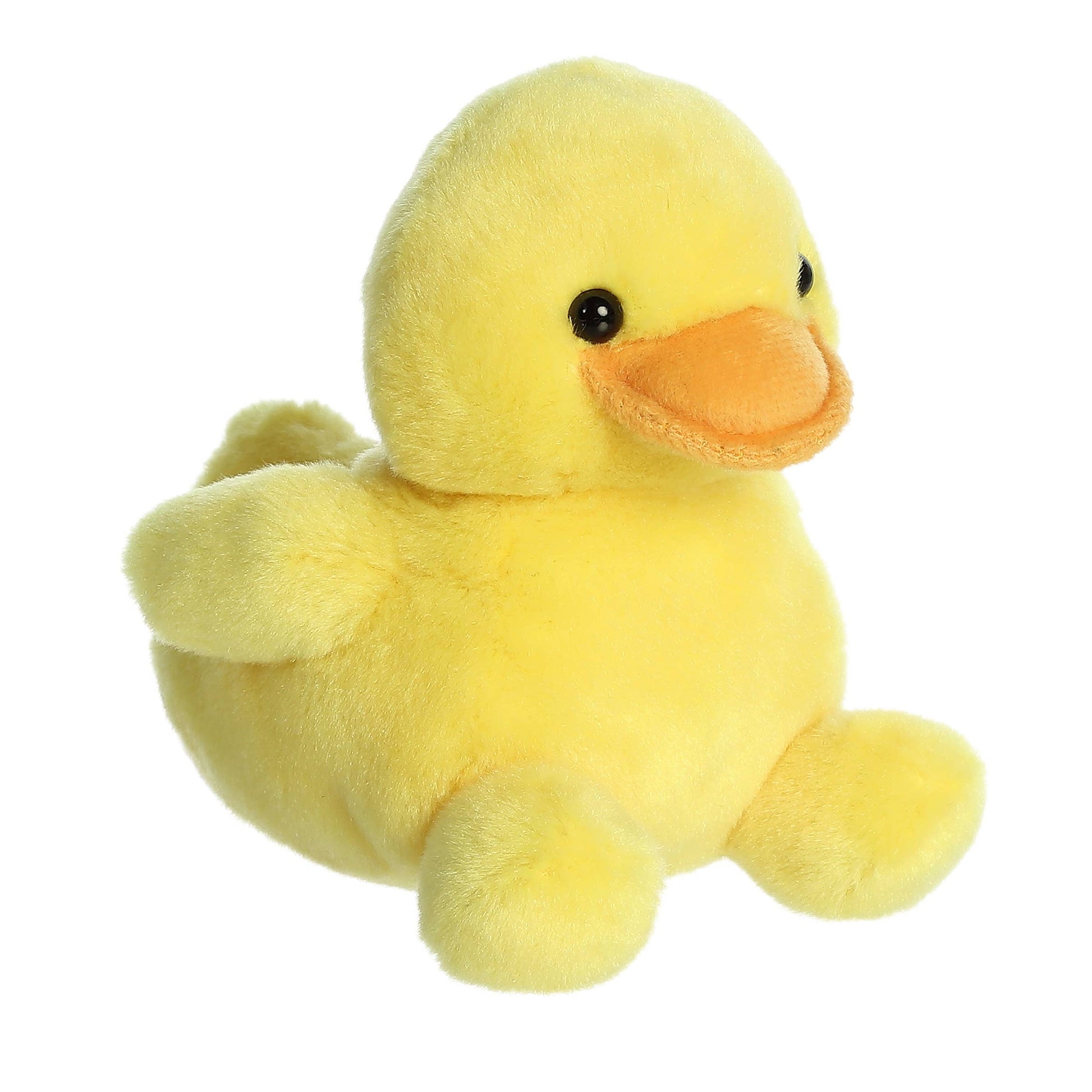 Yellow plush duck toy on a white background