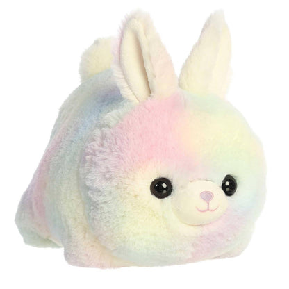 Multicolored plush toy with rabbit ears on a white background