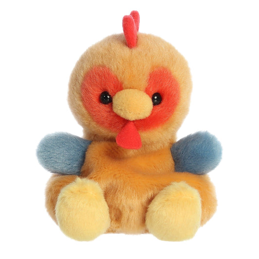 Plush toy rooster with red face and blue feet on a white background